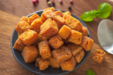 Plate with soup croutons and herbs