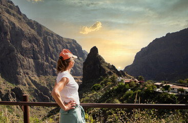 Naklejka premium woman looking at Masca mountain village Tenerife Canary islands