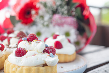 Raspberry biscuit and cream dessert, sweet dessert with raspberries, cake, brownie