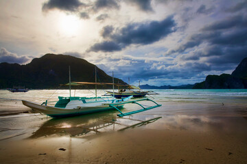Fototapeta na wymiar Traditional Boats on the Shore Near El Nido, Palawan, Philippines