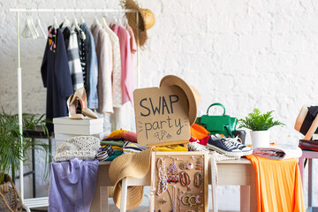 Swap home party - clothes, shoes, bags, jewellery exchange between friends. Zero waste shopping, eco friendly concept, sustainable lifestyle. College life - obrazy, fototapety, plakaty