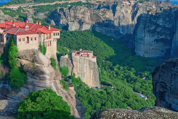 Stone monastery in the mountains. Kalabaka, Greece summer cloudy day in Meteora mountain valley. close up