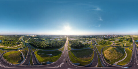 aerial full spherical seamless hdr 360 panorama over huge road junction of freeway at height of 200...