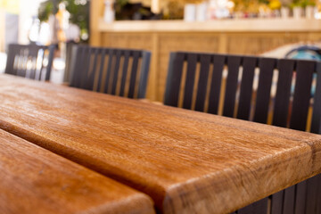 Table empty background in cafe ,restaurant background.Front view. . Dining table. Brochure background.Bar outside in summer vacation 