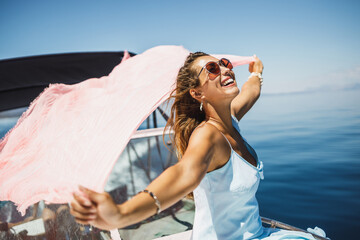 Woman With Scarf Spending Day On Yacht