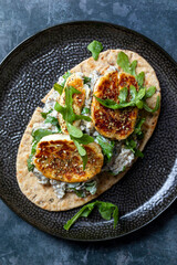 Aubergine and yogurt dip with halloumi and zaatar mix