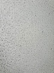 Raindrops on the top window (glass). Water drops on background.