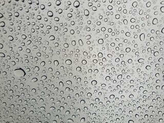 Raindrops on the top window (glass). Water drops on background.