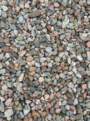 Small stone texture for background. High quality photo.
Rocks on a walk by the water.