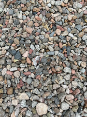 Small stone texture for background. High quality photo.
Rocks on a walk by the water.