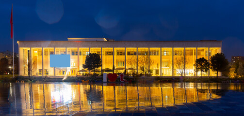 Evening landscape with a view of the National Opera and Ballet Theater of Albania, located in the city center on Skanderbeg .Square in Tirana © JackF