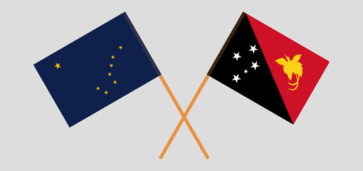 Crossed flags of the State of Alaska and Papua New Guinea. Official colors. Correct proportion