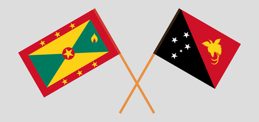 Crossed flags of Grenada and Papua New Guinea. Official colors. Correct proportion