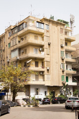 CAIRO, EGYPT - DECEMBER 29, 2021: View of a busy street in the Zamalek district of downtown Cairo in Cairo, Egypt