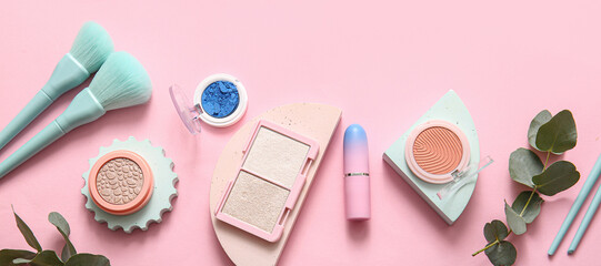 Set of decorative cosmetics and accessories on pink background, top view