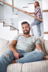 Fototapeta premium close up. young man sitting on sofa.