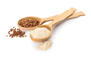 Spoons with flour and buckwheat grains on white background