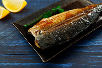 Grilled fish dish mackerel on the table
