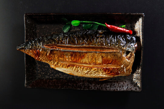 Grilled fish dish mackerel on the table