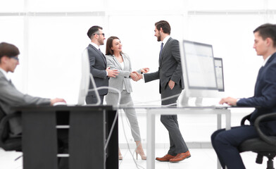 Salesmen and buyer discuss the contract