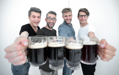 close up.mugs of beer in the hands of the fans.