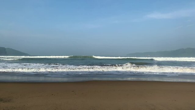 Beach landscape during the day with cloudy weather in Pacitan, Indonesia