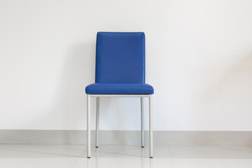 Blue chair in room with copy space.