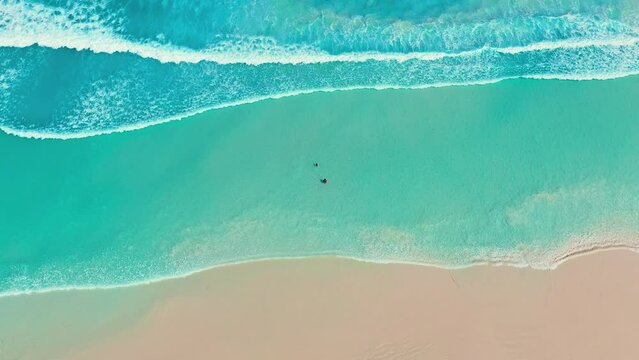 Aerial footage of a family enjoyinf beautiful beach in Esperance, Cape Le Grand National Park, Western Australia