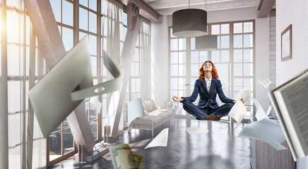 Beautiful businesswoman meditating . Mixed media