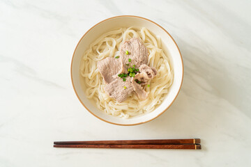udon noodles with pork in clear soup