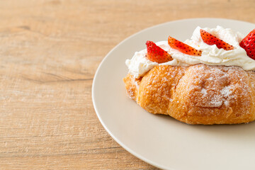 strawberry fresh cream croissant on plate