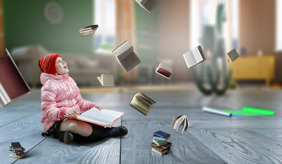 Little girl reading a book