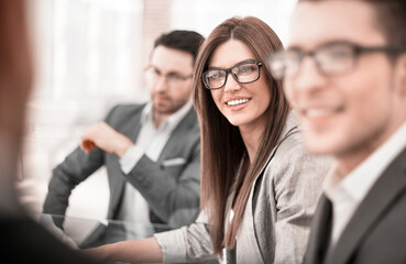 close up.successful business woman on the background of her colleagues