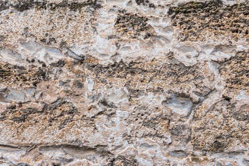 Detail of stone texture for background. Surface of the marble with brown tint