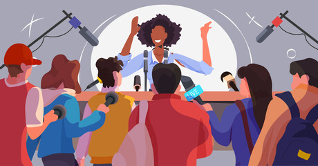 african american businesswoman or politician giving speech interview to journalists with microphones business conference