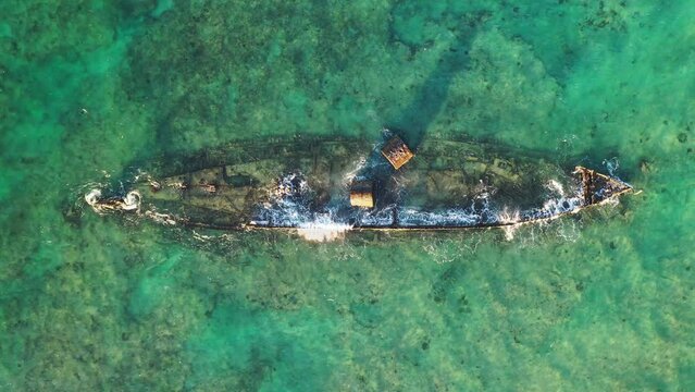 Aerial footage of beautiful Midura ship wreck in Exmouth, Western Australia