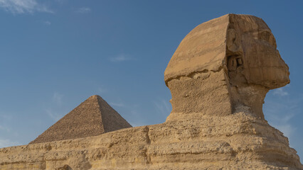 Sculpture of the Great Sphinx. Close-up. Profile view. The head and part of the back are visible....