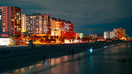 Clearwater Beach Florida at Night. Panorama of city Clearwater Beach FL. Summer vacations in Florida. Beautiful View on Hotels and Resorts on Island. American Coast or shore Gulf of Mexico. 