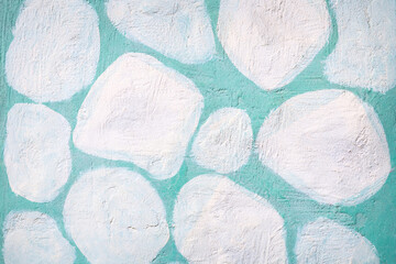 Mint green stone wall texture with painted white circles. Background abstract vintage painted