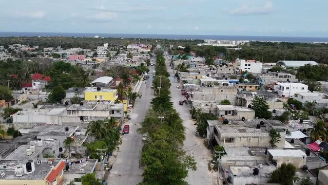 Aerial shot of houses and street view of Akumal Mexico.