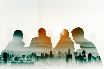 Business people meeting with misty city background