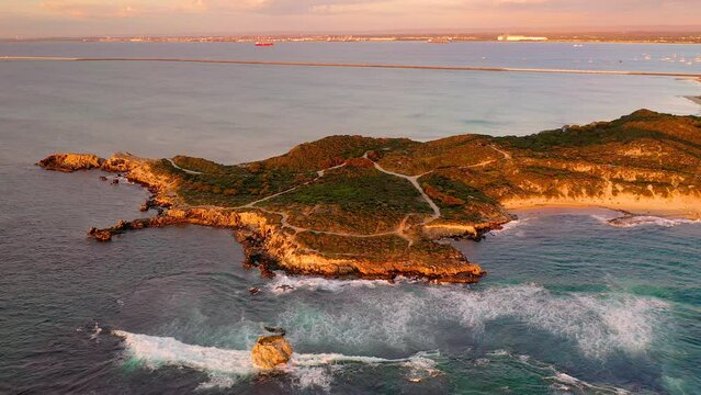 Aerial footage of sunset, beach, and sky in Point peron, Western Australia