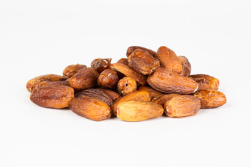 Heap of pitted dates isolated on white background
