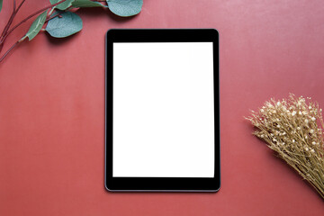 tablet similar to ipades style, on bright peach background, mockup or template