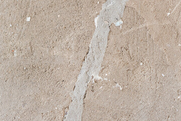 Cracked concrete surface. Background or texture of retro cement brick plaster wall with cracks