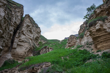 Bizarre forms of weathered sandstone in the mountains. The rocks are composed of sandstones and...