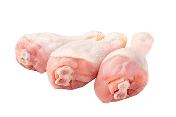 Isolated three fresh raw chicken legs on white background