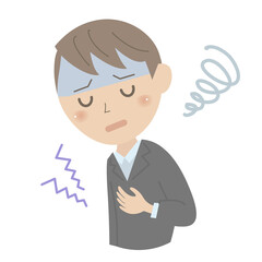 ストレスで胃が痛む男性
