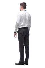 serious young businessman looking at big white screen