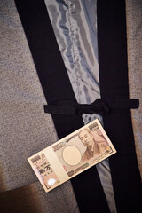 Japanese money on yukata background